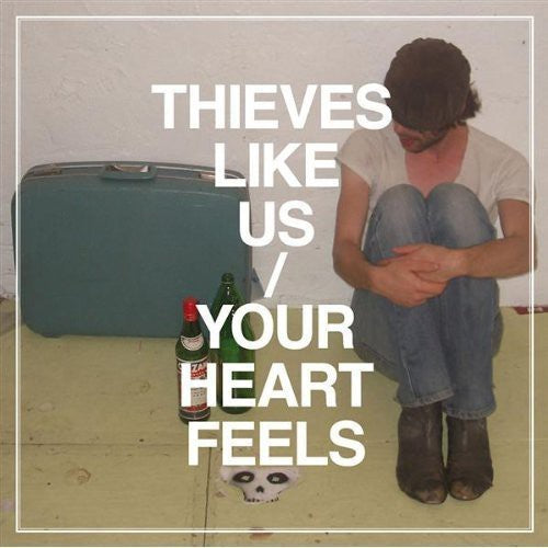 the album cover for Thieves Like Us - Your Heart Feels