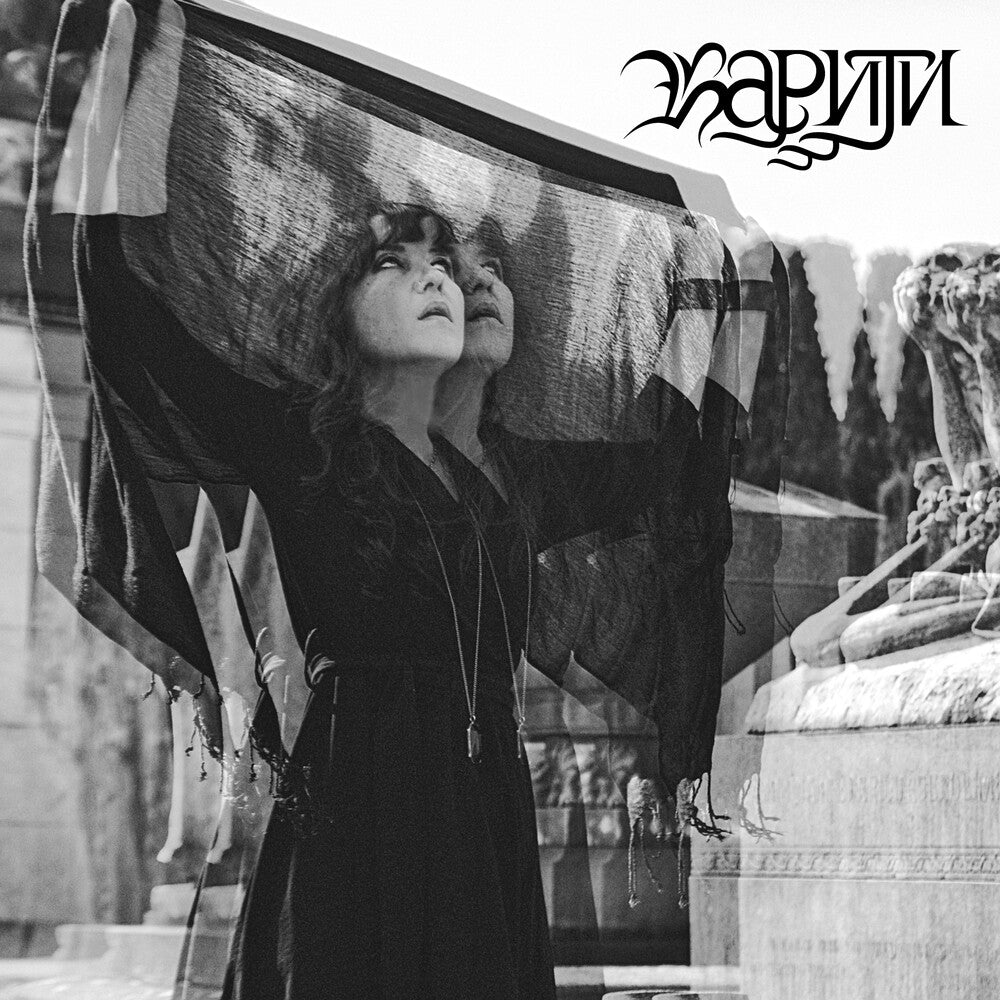 the album cover for Kariti - Covered Mirrors