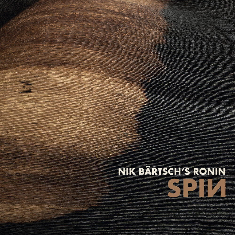 the album cover for Nik Baertschs Ronin - Spin (Uk)