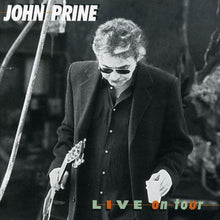 the album cover for John Prine - Live on Tour