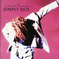 the album cover for Simply Red - New Flame
