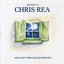 the album cover for Chris Rea - Best Of: New Light Through Old Windows