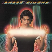 the album cover for Andre Cymone - Livin in the New Wave