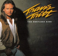 the album cover for Travis Tritt - Restless Kind