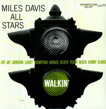 the album cover for Miles Davis - Walkin