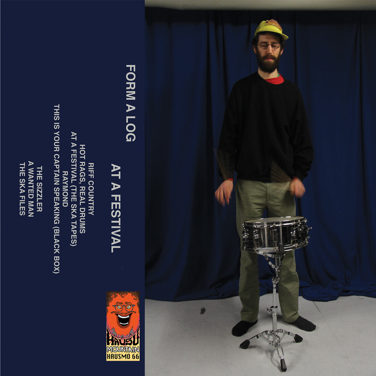 At A Festival (GRAY CASSETTE) [Cassette]