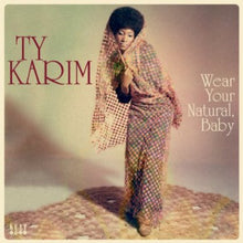 the album cover for Ty Karim - Wear Your Natural Baby [Import]