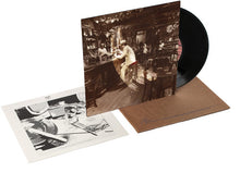 the album cover for Led Zeppelin - In Through The Out Door: Remastered Original Album [Vinyl]