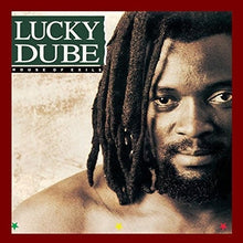 the album cover for Lucky Dube - House of Exile