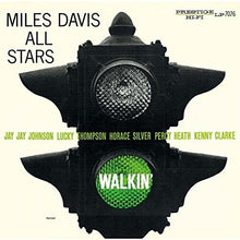 the album cover for Miles Davis - Walkin
