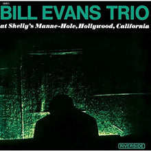 the album cover for Bill Evans - Trio At Shelly's Manne-Hall