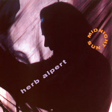 the album cover for Herb Alpert - Midnight Sun