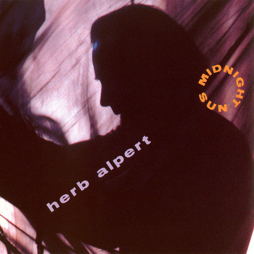the album cover for Herb Alpert - Midnight Sun
