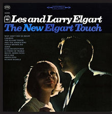 the album cover for Les Elgart & Larry - New Elgart Touch