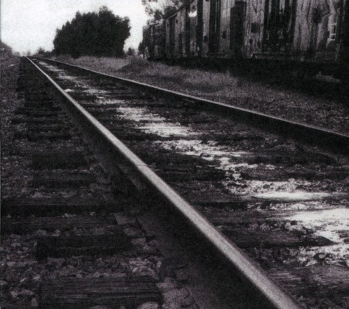 the album cover for Mark Kozelek - What's Next to the Moon
