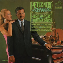 the album cover for Peter Nero - Peter Nero Plays a Salute to Herb Alpert & The Tijuana Brass