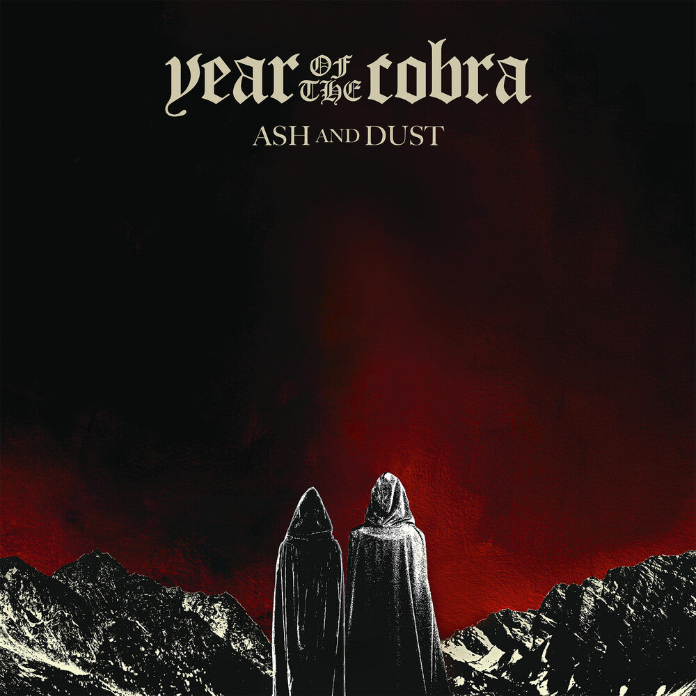 the album cover for Year Of The Cobra - Ash And Dust [Digipak]