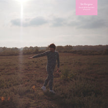 the album cover for Tim Burgess - Ascent Of The Ascended