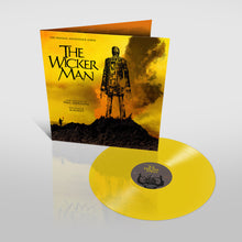 the album cover for Paul Giovanni  / Carpenter,Gary (Colv) (Ylw) (Aniv) - Wicker Man / O.S.T. [Colored Vinyl] (Ylw) (Aniv) (Uk)