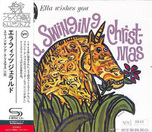 the album cover for Ella Fitzgerald - Ella Wishes You A Swinging Christmas (SHM-CD)