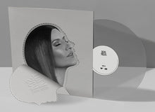 the album cover for Laura Pausini - Scatola / Caja - Ltd Numbered 180gm Clear Vinyl