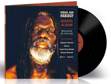 the album cover for Tiken Fakoly  Jah - Braquage De Pouvoir (Fra)