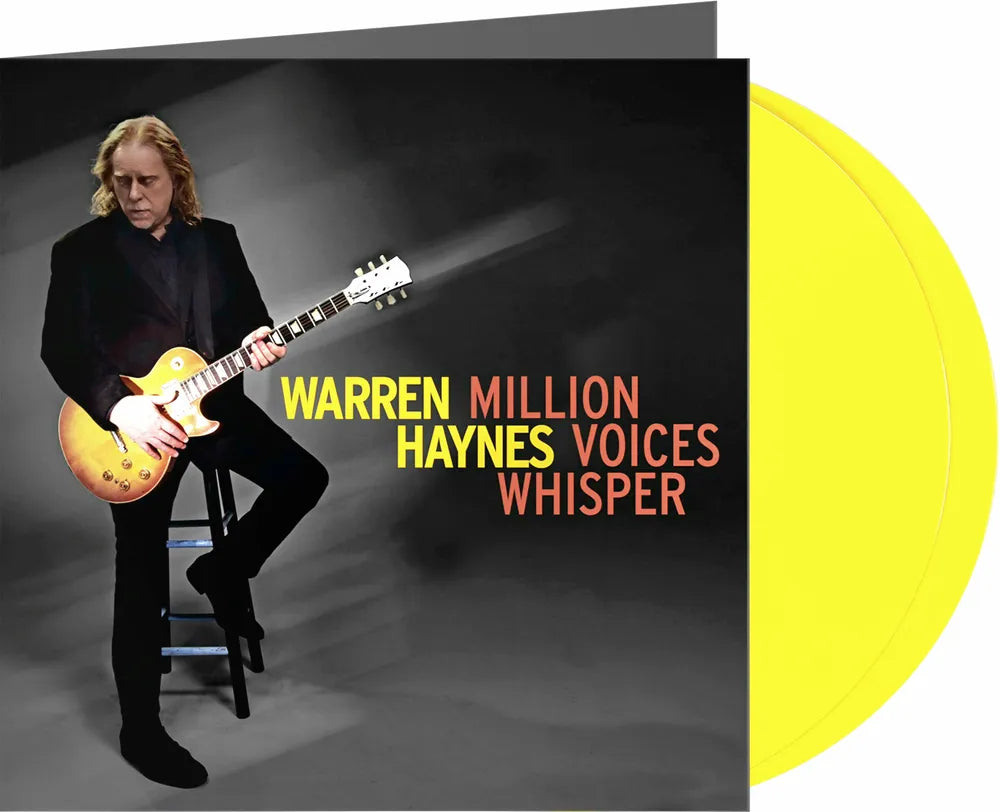 the album cover for Warren Haynes - Million Voices Whisper [Colored Vinyl] [Limited Edition] (Ylw) (Uk)