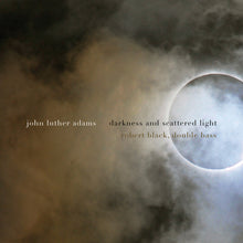 the album cover for Adams / Black - Darkness & Scattered Light