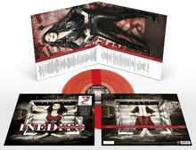 the album cover for Laura Pausini - Inedito [Clear Vinyl] [Limited Edition] [180 Gram] (Red) (Numb) (Ita)