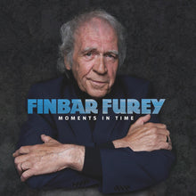 the album cover for Finbar Furey - Moments In Time