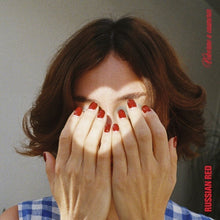 the album cover for Russian Red - Volverme A Enamorar (Spa)