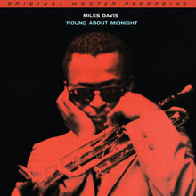 the album cover for Miles Davis - 'Round About Midnight