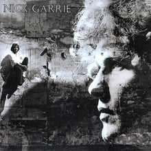 the album cover for Nick Garrie - Nightmare Of J.B. Stanislas B/W Around The World