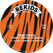 the album cover for Tiger Stripes - I Hear It Through The Bassline