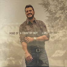 the album cover for Luke Bryan - Mind Of A Country Boy (Blue) [Colored Vinyl]