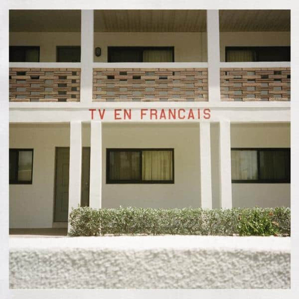 the album cover for We Are Scientists - TV En Francais: 10th Anniversary - Expanded 'Veggie Plate' Green Colored Vinyl