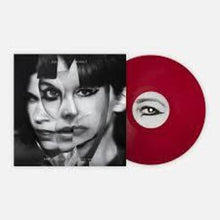 the album cover for Sleater-Kinney - Center Won't Hold [Colored Vinyl] [180 Gram] (Red) (Can)