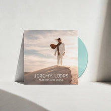 the album cover for Loops, Jeremy - Feathers and Stone (IEX) Black/Green