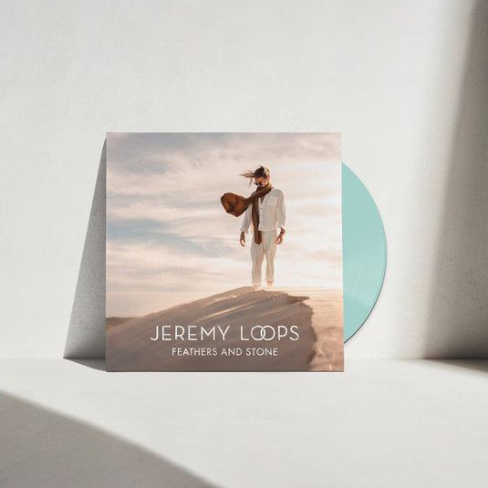 the album cover for Loops, Jeremy - Feathers and Stone (IEX) Black/Green