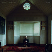 the album cover for SYML - Nobody Lives Here [Digipak]