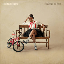 the album cover for Tanika Charles - Reasons To Stay