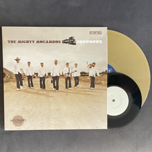 the album cover for Mighty Mocambos - Showdown