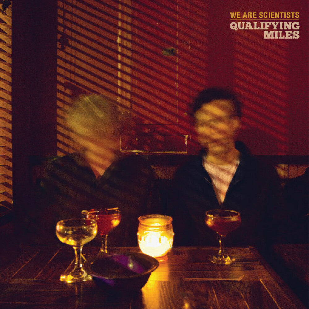 the album cover for We Are Scientists - Qualifying Miles