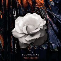 the album cover for Bootblacks - Thin Skies (Blue) [Colored Vinyl]