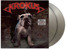 the album cover for Krokus - Dirty Dynamite - Limited 180-Gram Silver Colored Vinyl