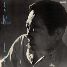the album cover for Takeo Moriyama - Smile (Blue) [Colored Vinyl] [Clear Vinyl] (Gate)