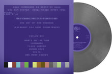 the album cover for Rob Hubbard  (Colv) (Gry) (Ltd) (Fra) - C64 Greatest Sids: Art Of Rob Hubbard - Grey Vinyl
