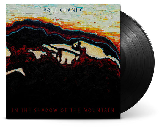 the album cover for Cole Chaney - In The Shadow Of The Mountain