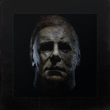the album cover for John Carpenter  / Carpenter,Cody / Davies,Daniel - Halloween - O.S.T. (Exp)