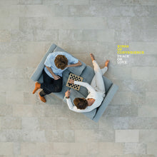 the album cover for Kings Of Convenience - Peace Or Love [Reissue]